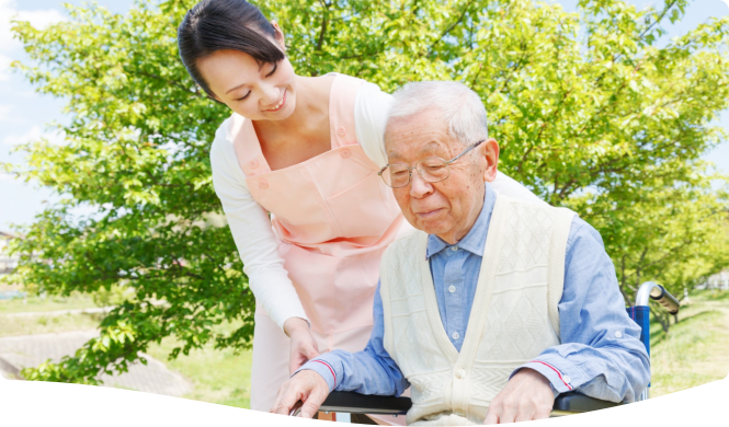 caregiver assisting her elderly patient